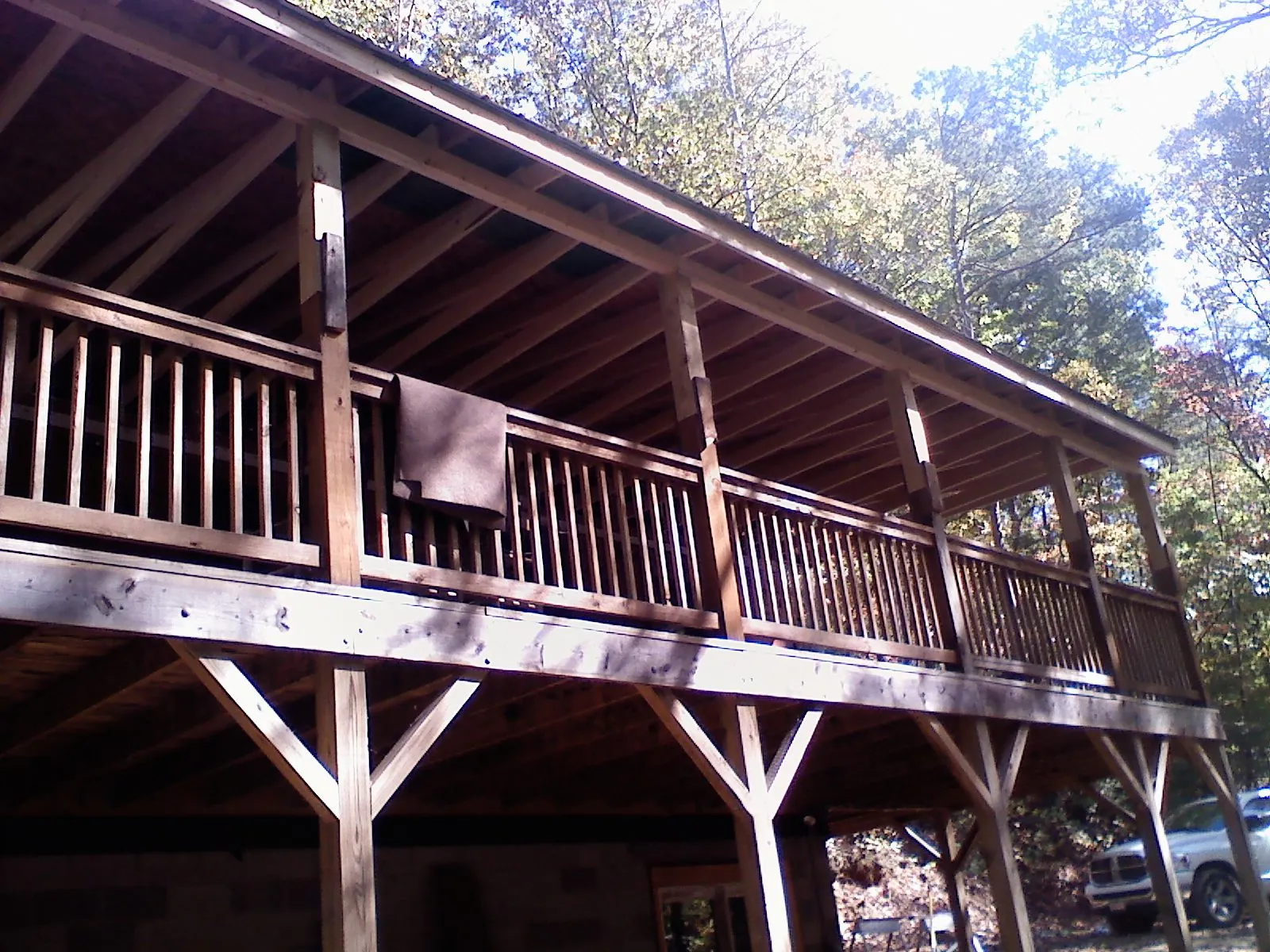 Timber framing under a new elevated porch and deck — Roof Leak Repair in Lynn Center by Roofing Brothers
